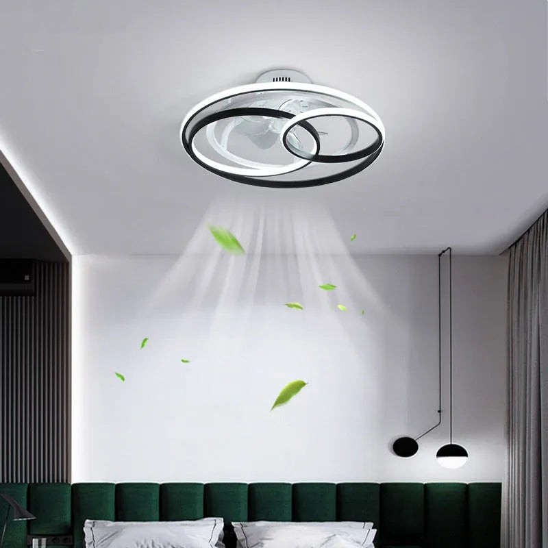 Ceiling-mounted fan light with metal blades and a white acrylic lampshade, shown in a room setting.