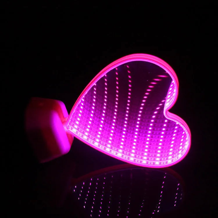 Rose red double-sided love tunnel shaped LED decorative light on a table