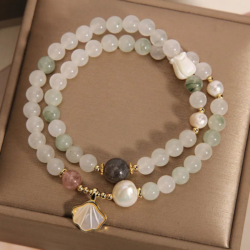 Women's crystal bracelet with gold-plated Tianshan jade shell ginkgo leaf pendant and rhinestone accents