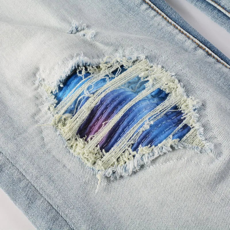 Bright white washed distressed cat beard patch ripped slim straight leg mid waist jeans cotton denim