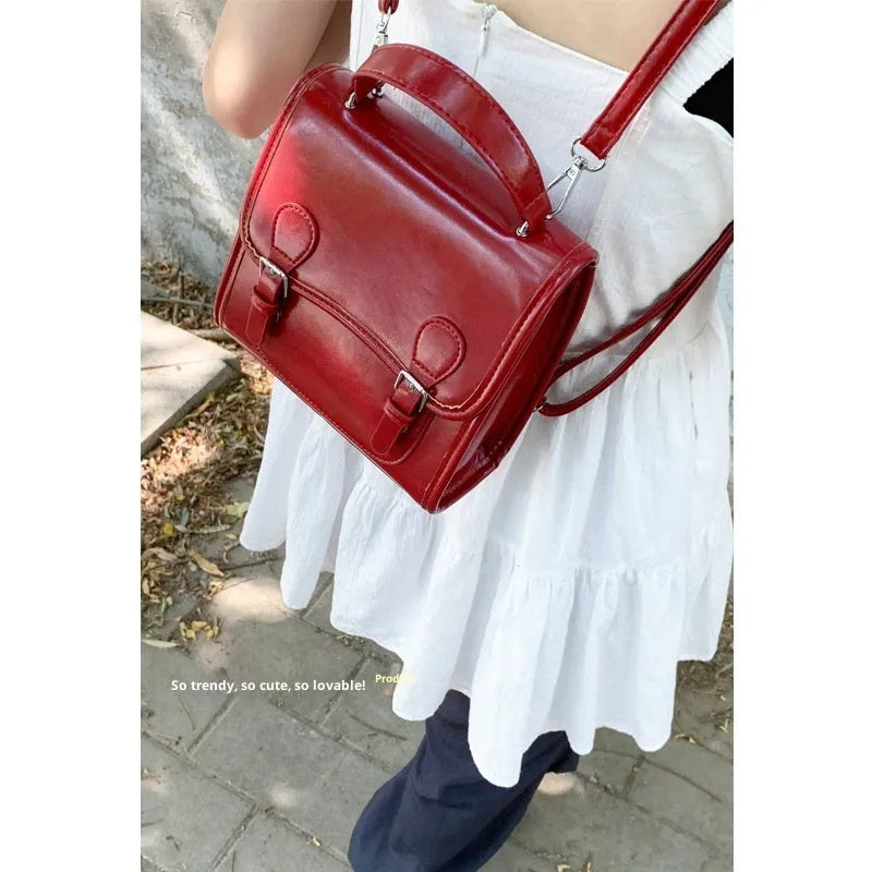 New simple college-style all-matching PU backpack in black with sewing thread detail