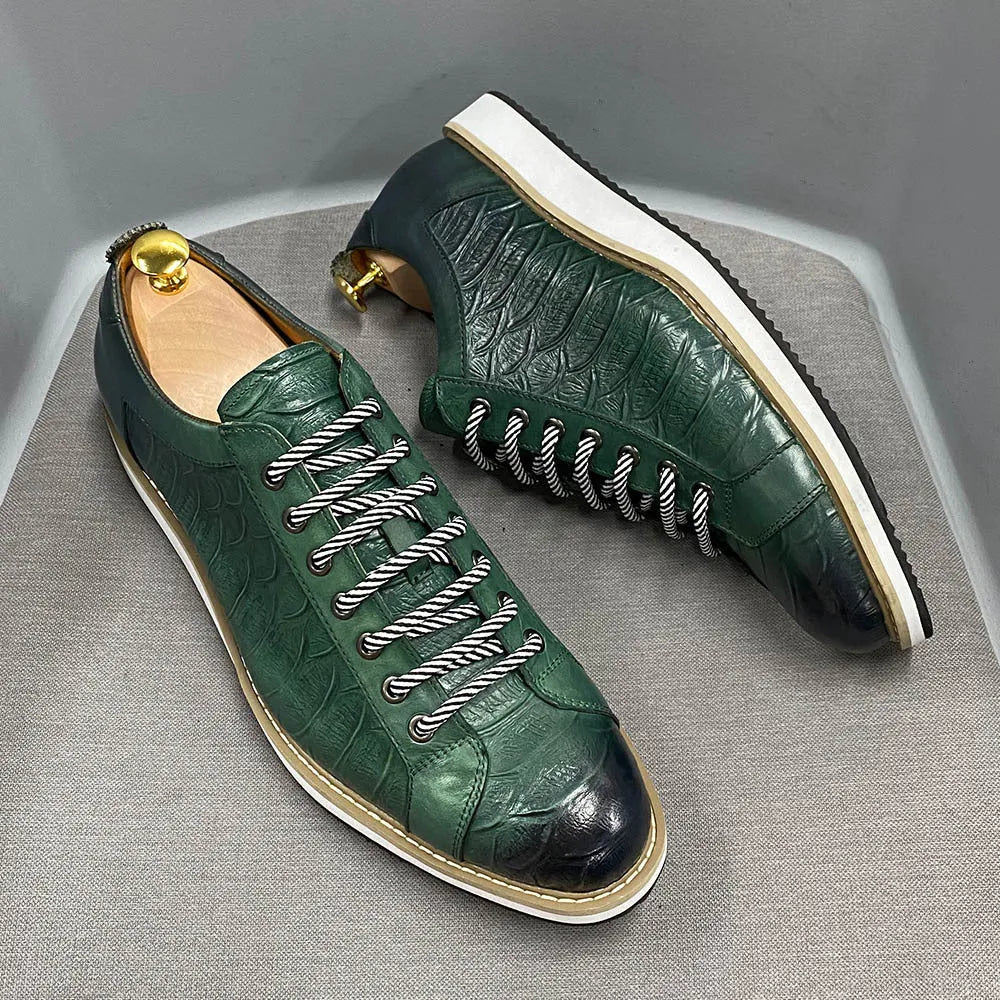 Men's low-tube casual shoes with an embossed pattern on the upper and front tie lacing.