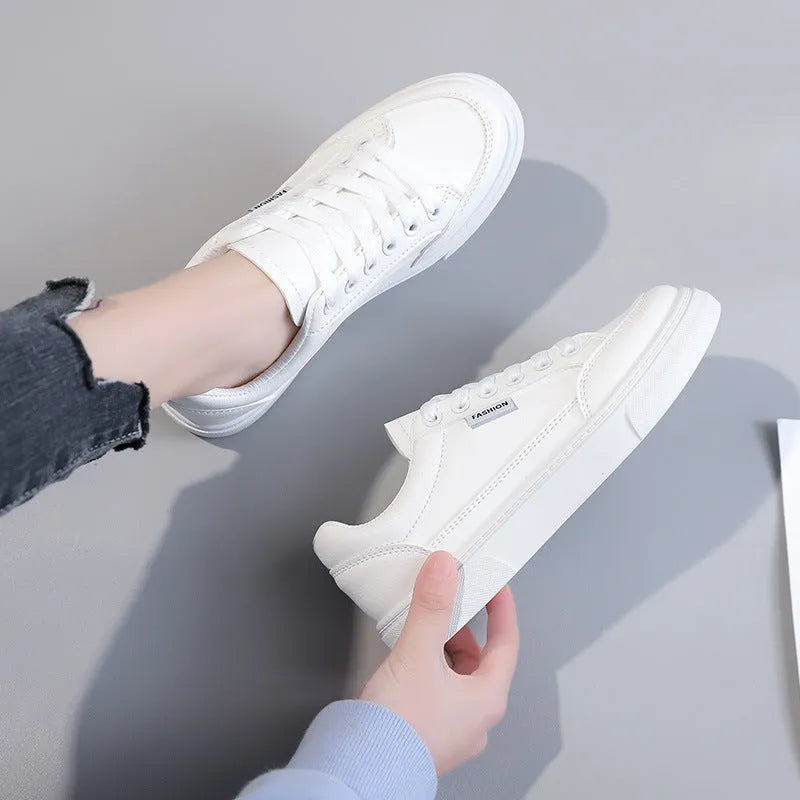 Korean-style low-top sneakers in white and brown with artificial PU leather upper and plastic sole
