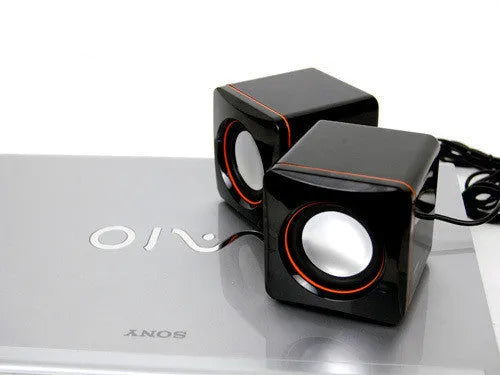 Small black square USB-powered computer speaker for 700B PC model