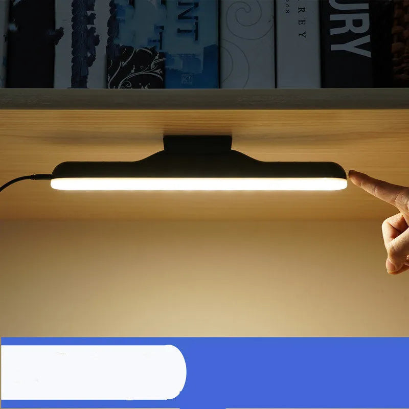 Modern plastic LED desk lamp with touch switch, built-in lithium battery, and adjustable brightness on a desk