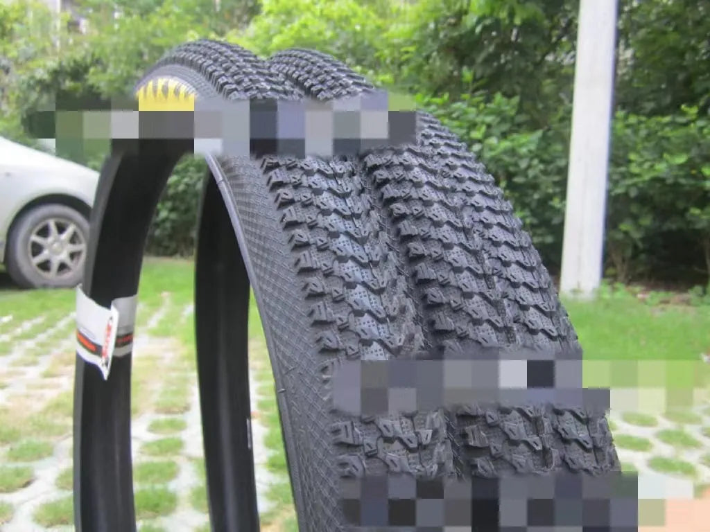 Ultralight mountain bike puncture proof tyre showing tread and available in multiple wheel sizes