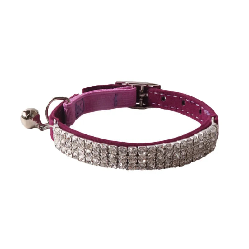 Flannel elastic buckle cat collar with gang drill decoration in assorted colours on a white background.
