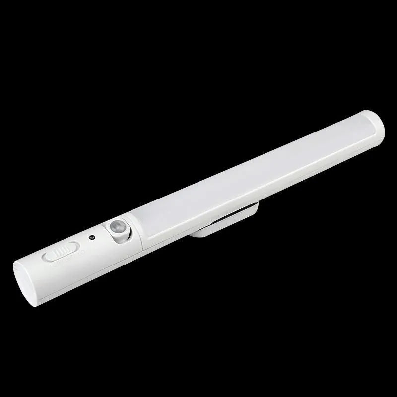 Battery-powered infrared sensor LED wall light with magnetic mount for cabinets.
