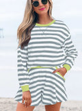 Ladies' black stripe co-ord set with long sleeve blouse and loose shorts on a hanger.