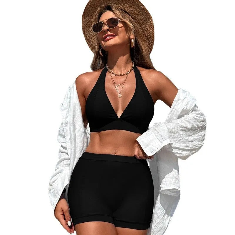 Women's black split bikini swimsuit made from nylon fabric for swimming and hot springs.