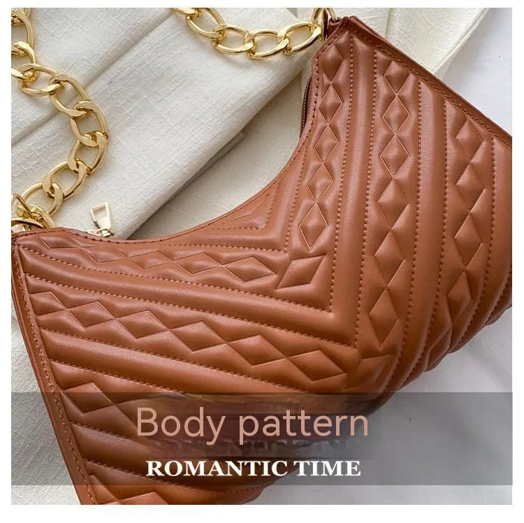 Brown pleated PU leather vertical square shoulder bag with a chain strap and soft handle.