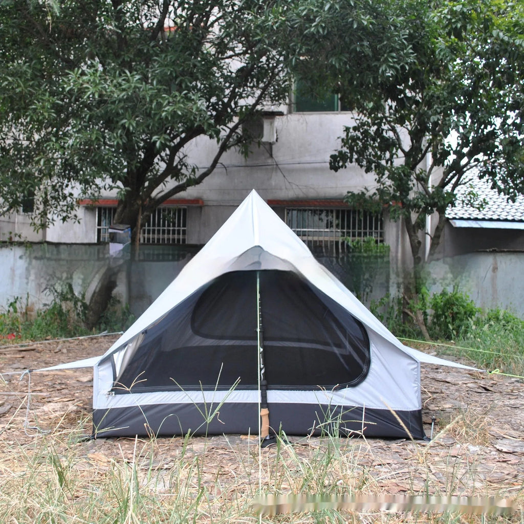 Brown A-line trekking tent pitched using hiking poles with dimensions 210x150x110cm