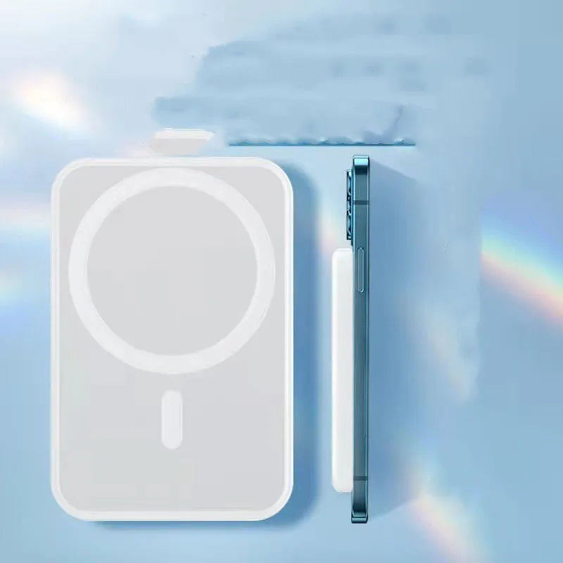 White portable magnetic wireless charger power bank showing compact design and charging surface