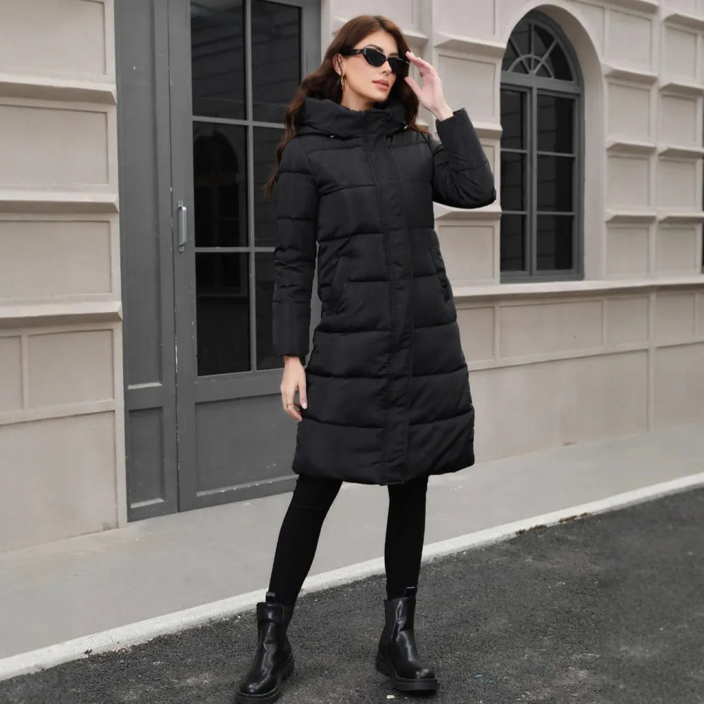 Black slim-fit men's hooded cotton jacket for cold weather, shown on a model.