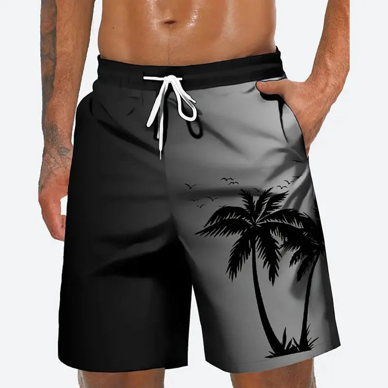 Man wearing loose grey polyester beach shorts on sand, showing casual fit.