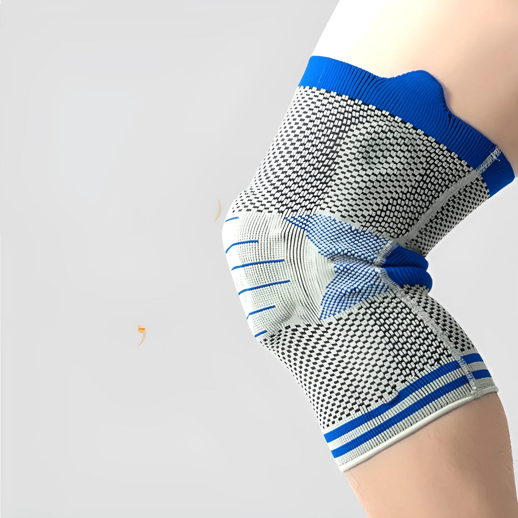 A black and grey cotton knee pad showing a silicone massage spring bar shock absorber on the knee area.
