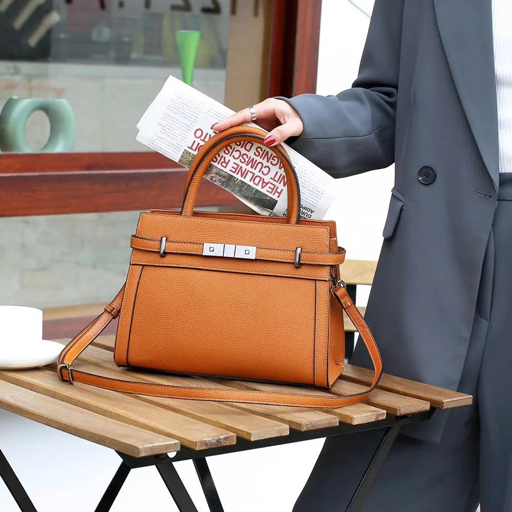 Genuine leather small square shoulder bag in almond green with internal organisation compartments