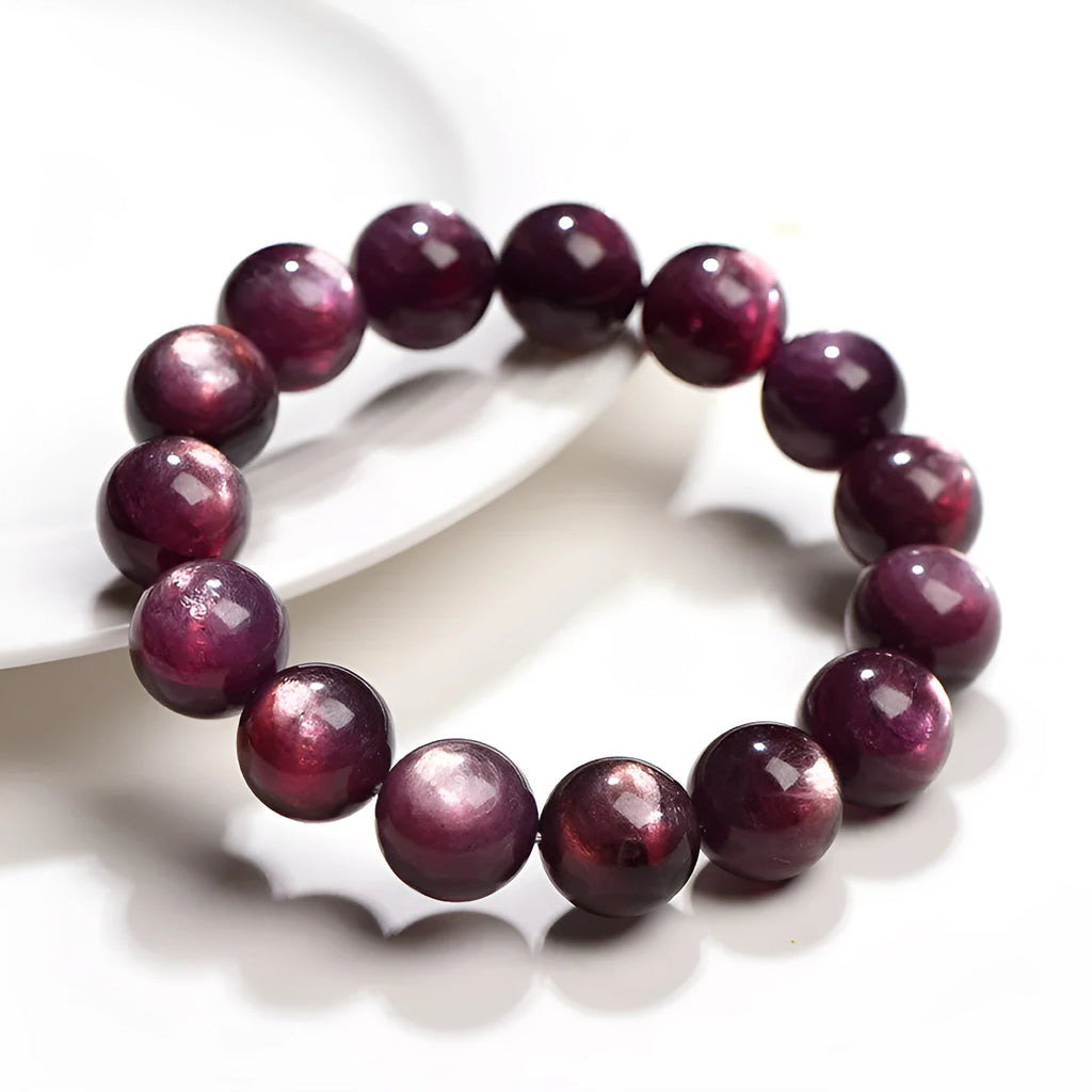 Purple lepidolite crystal bracelet with round polished beads showing multiple size options