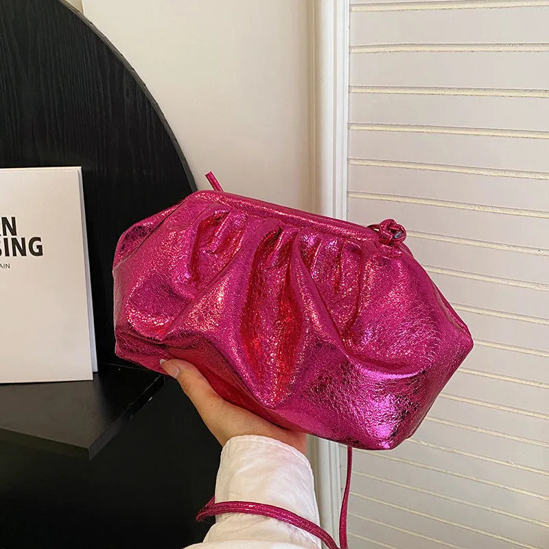 Simple hair clip shoulder crossbody bag in shell shape made from PU leather, shown in rose red colour.