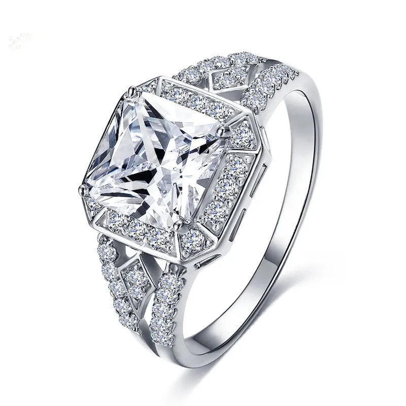 Geometric women's zircon ring with hollow design and platinum-colour finish