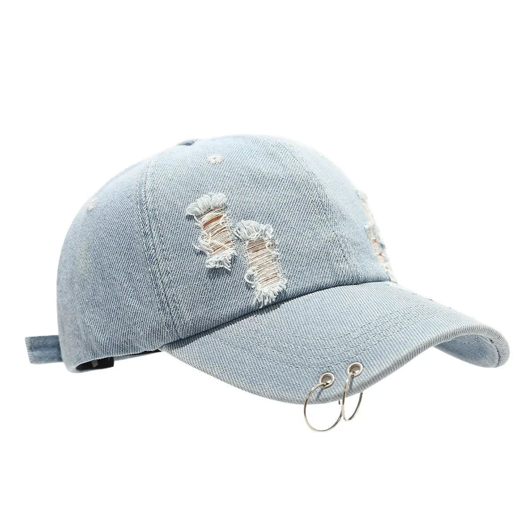 Men's adjustable denim peaked cap with dome crown in light blue jeans colour on a plain background