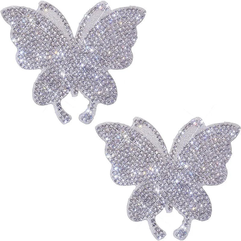 Diamond-encrusted car sticker with butterfly or bear paw design measuring 7 by 6 centimetres