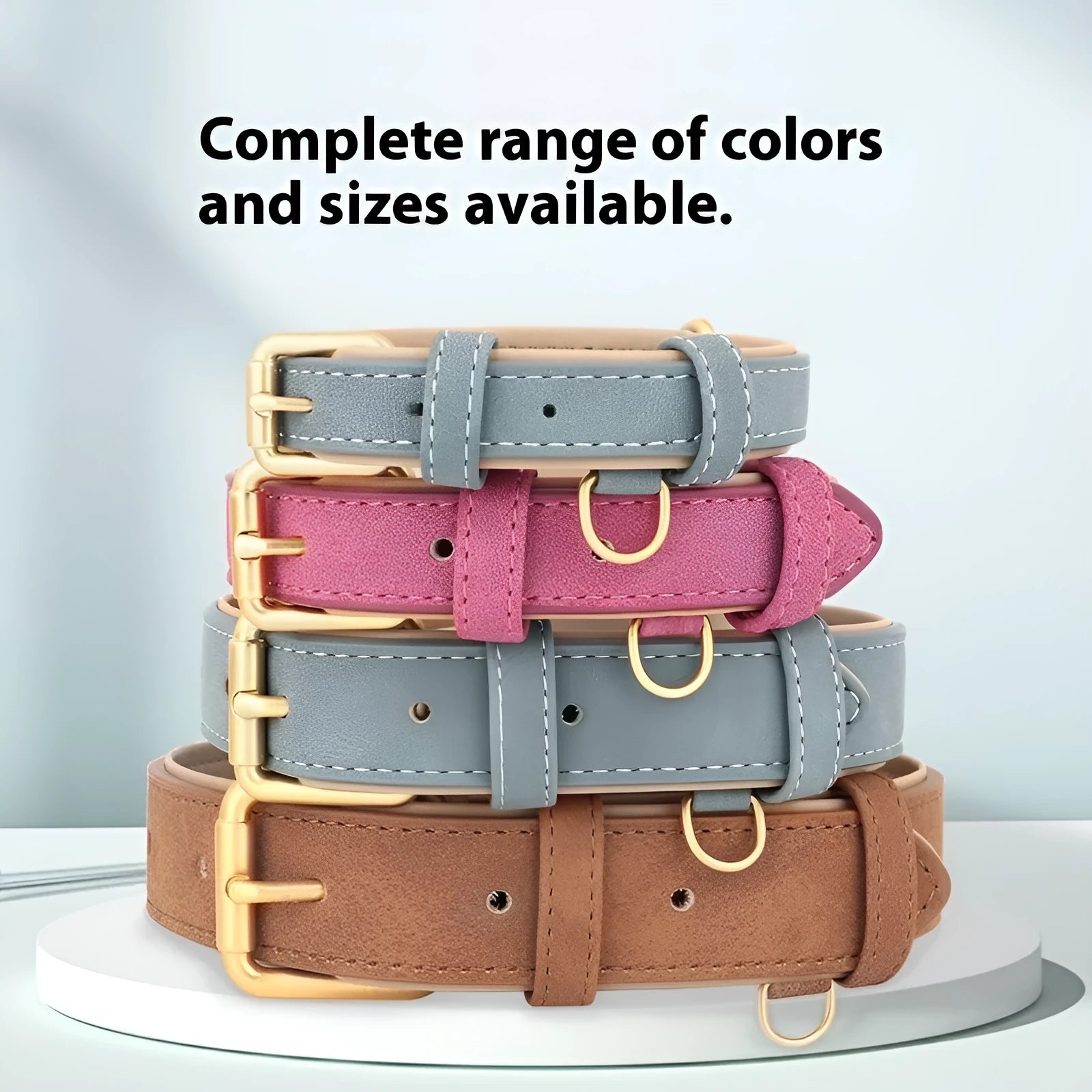 A brown double-layer leather dog collar with mohair lining and a matching lead, laid flat.