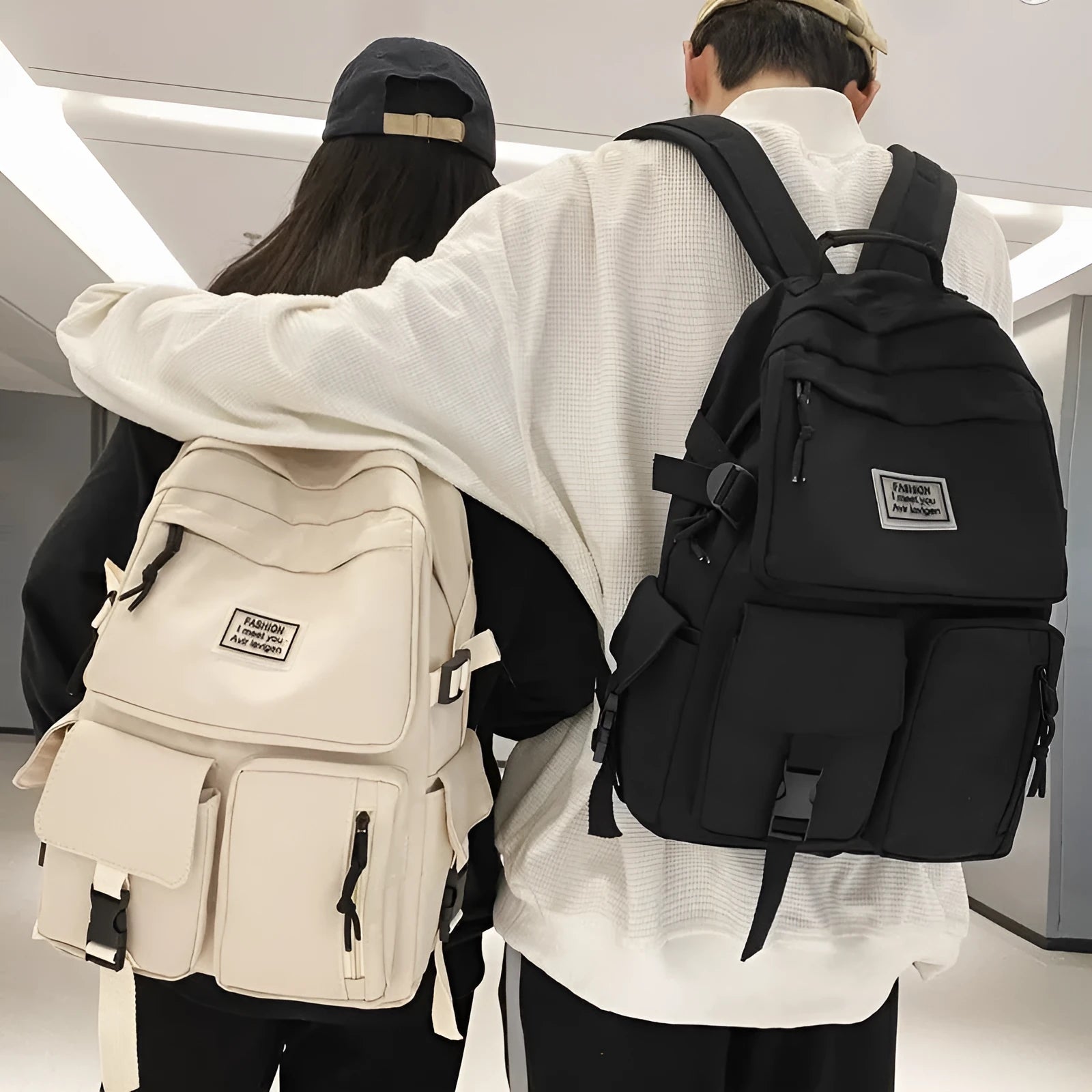 Soft nylon student backpack in black with a three-dimensional front pocket.