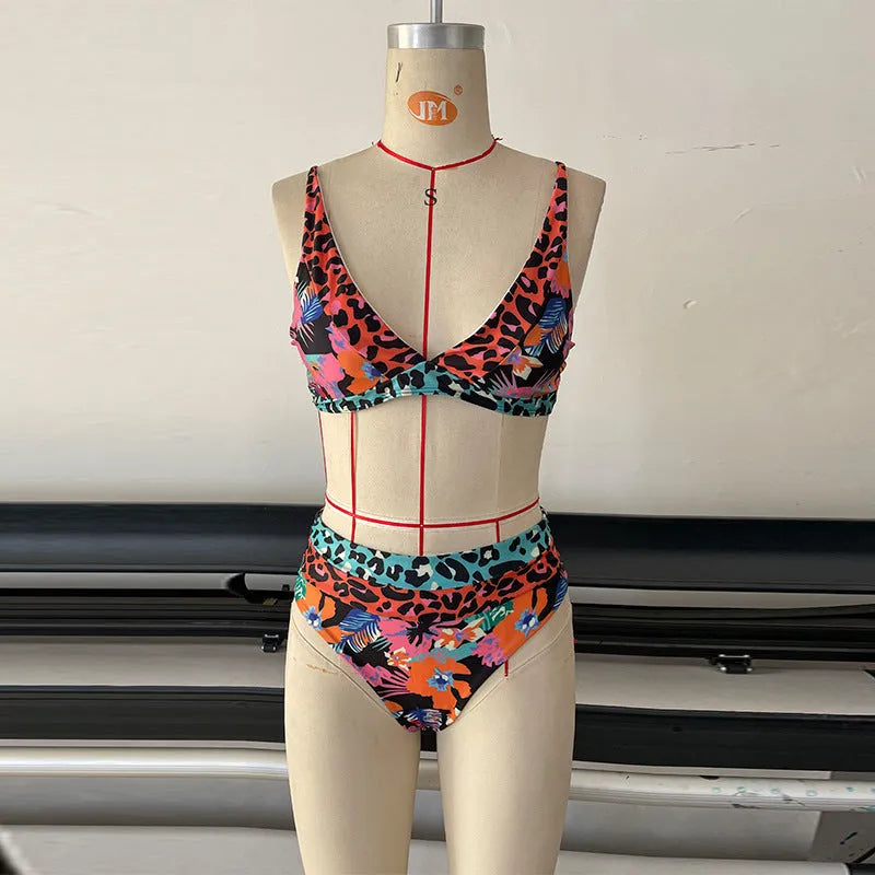 Women's floral print high-waist bikini set in polyester for swimming.