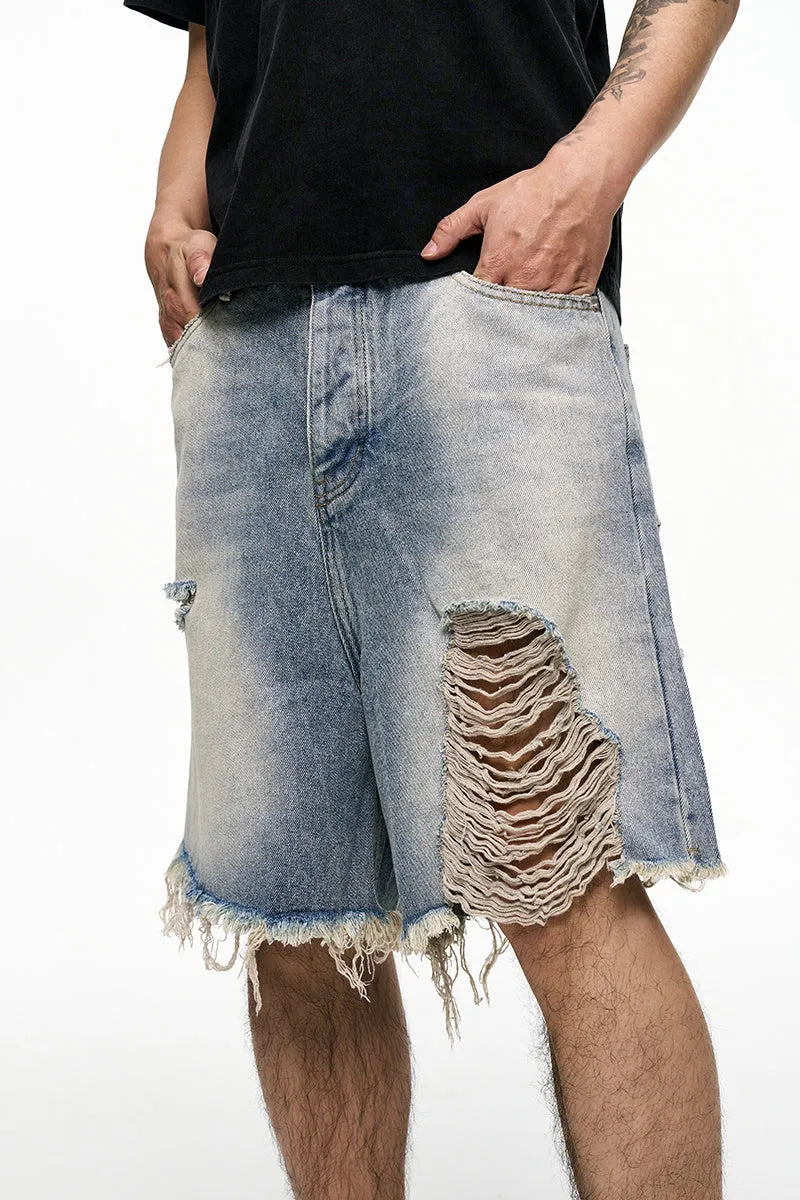 Light blue retro washed men's baggy denim shorts with wide leg cut and fifth pants length