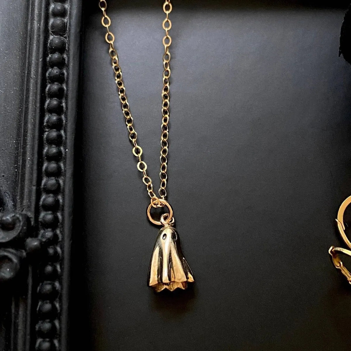 Ghost pendant necklace with titanium steel ghost motif and stainless steel twisted chain