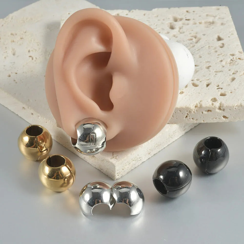 Stainless steel hollow skull Buddha earrings showing four electroplated colour options