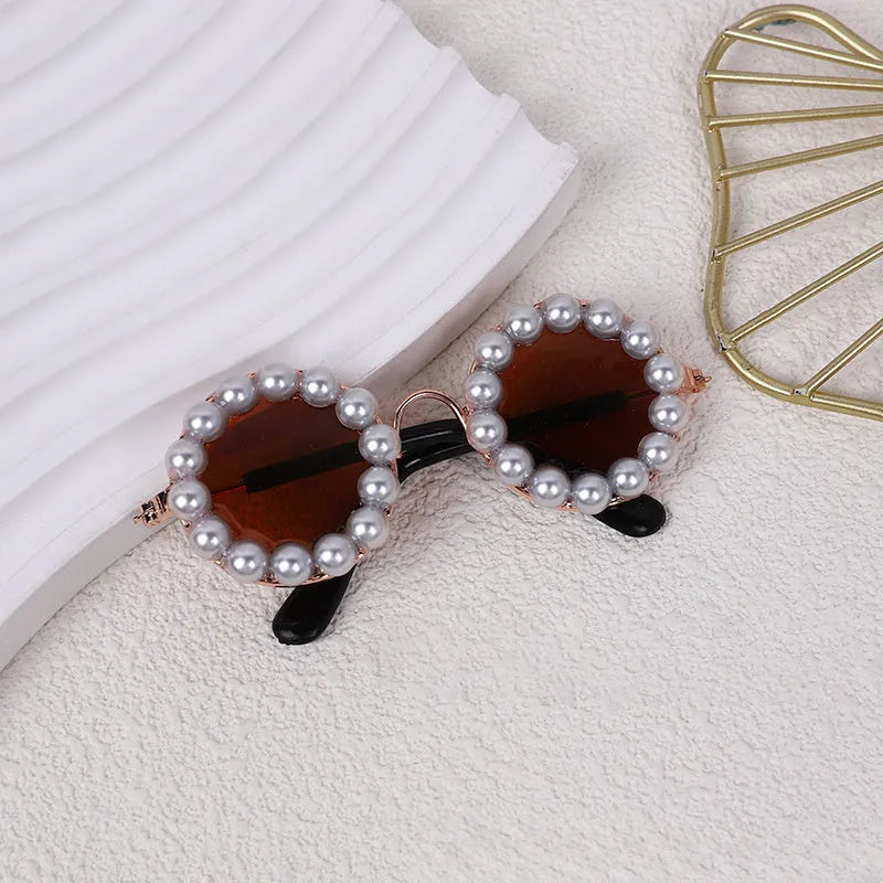 Cat and dog pearl-rimmed round sunglasses in multiple colours for pet party dress-up
