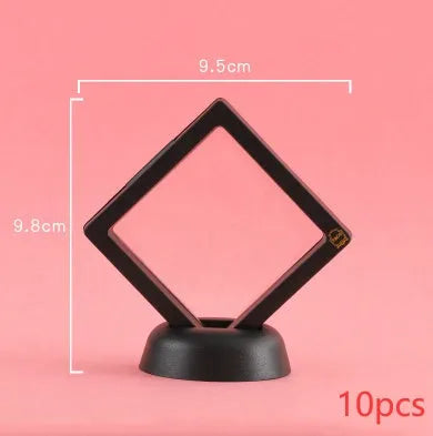 Transparent 3D floating display case holding a coin, with black and white size options