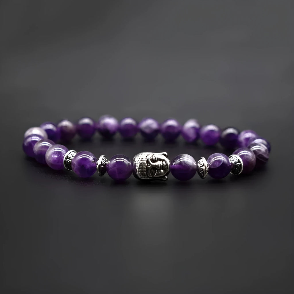 19mm Buddha head charm bracelet showing five material options: amethyst, black agate, pink crystal, green gold, and tiger eye.