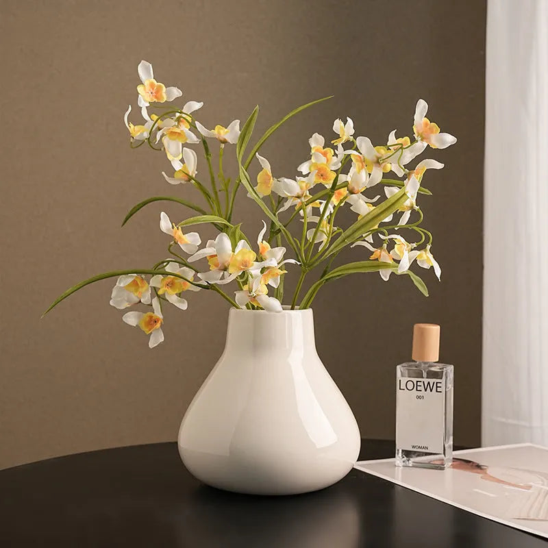 Ceramic decorative vase set with artificial orchid flowers in black or white coloured glaze finish