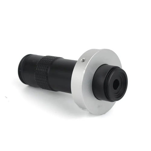 Black industrial monocular camera lens for 0.1-1.3X magnification with 60-300mm working distance.
