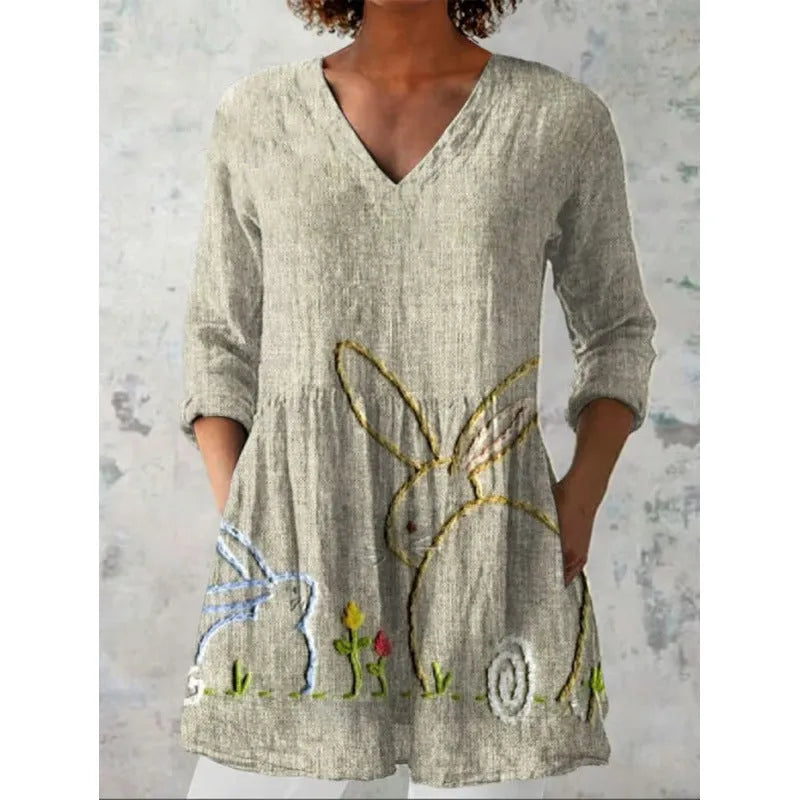 Women's printed loose dress with 3/4 sleeves and a wave skirt, shown in a variety of pattern styles.