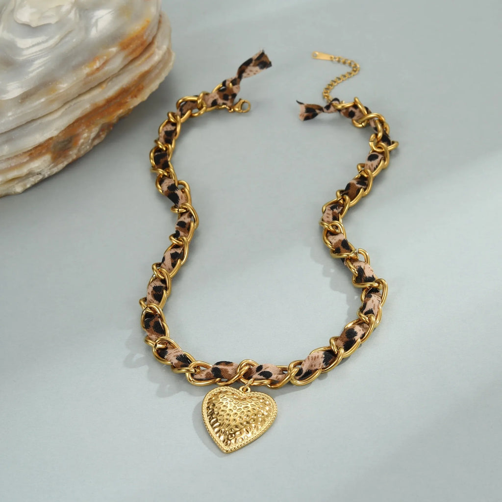 Stainless steel necklace with geometric leopard love pendant on 41-50cm chain, 18K electroplated finish