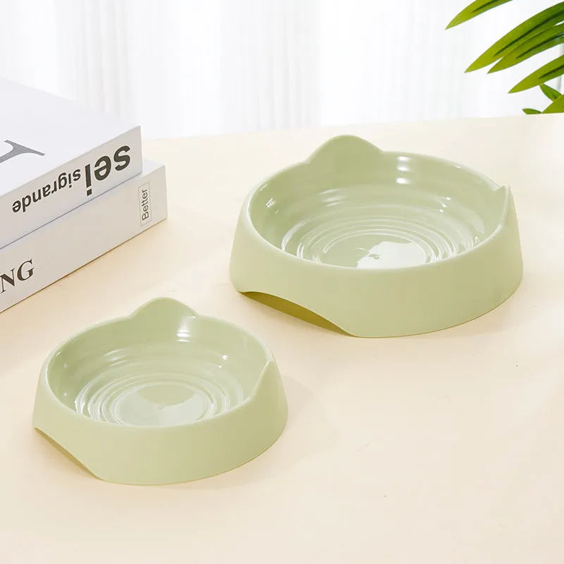 Blue ceramic dog slow feeder bowl with raised internal maze pattern for portion control