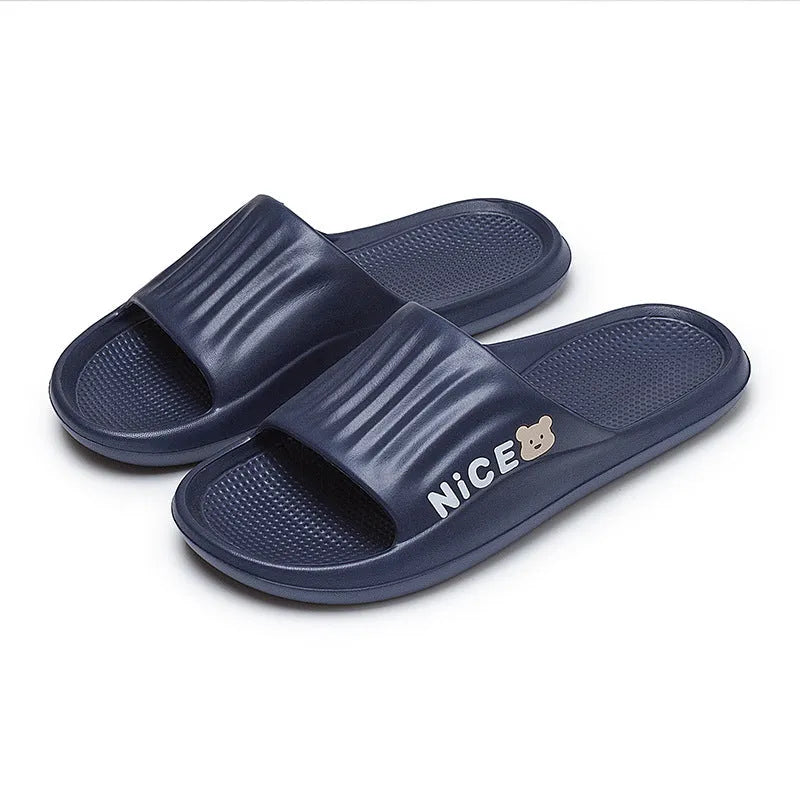 EVA injection moulded cartoon pattern slippers in dark blue with non-slip sole, available in sizes 36-45