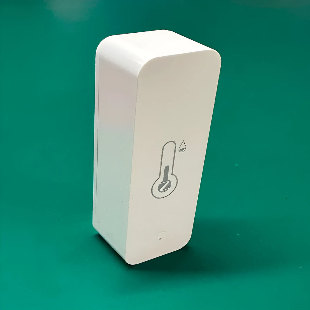 WiFi temperature humidity sensor with Tuya Zigbee connectivity in compact ABS housing