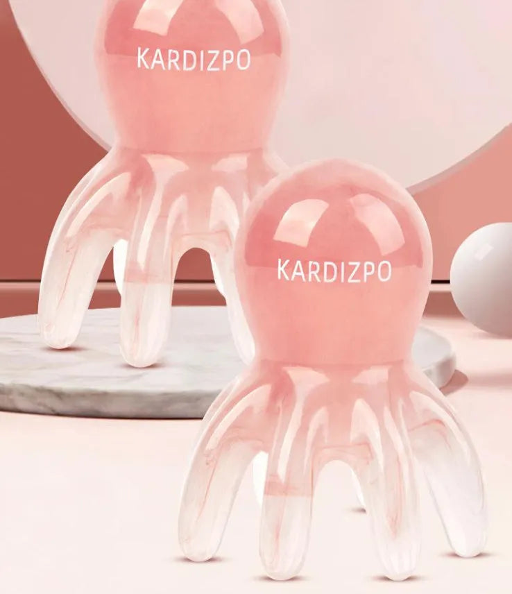 Pink octopus-shaped natural resin massage comb for periocular meridian treatment