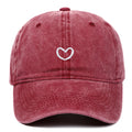 Adjustable retro-style cotton baseball cap with embroidered detailing, shown in a selection of colours.