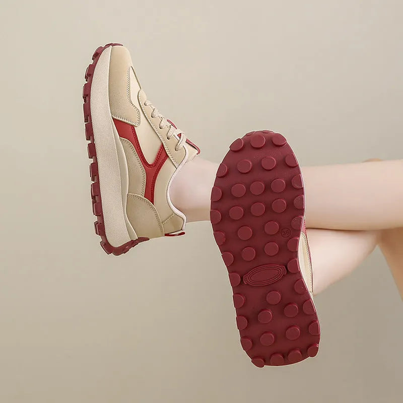 Women's low-top platform sneakers in Card Black with a flat rubber sole and front lace-up closure.