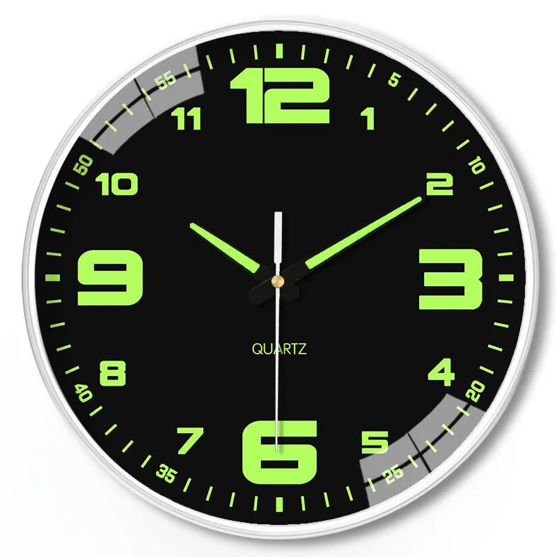 Modern 8 inch diameter luminous wall clock with plastic shell on a wall.