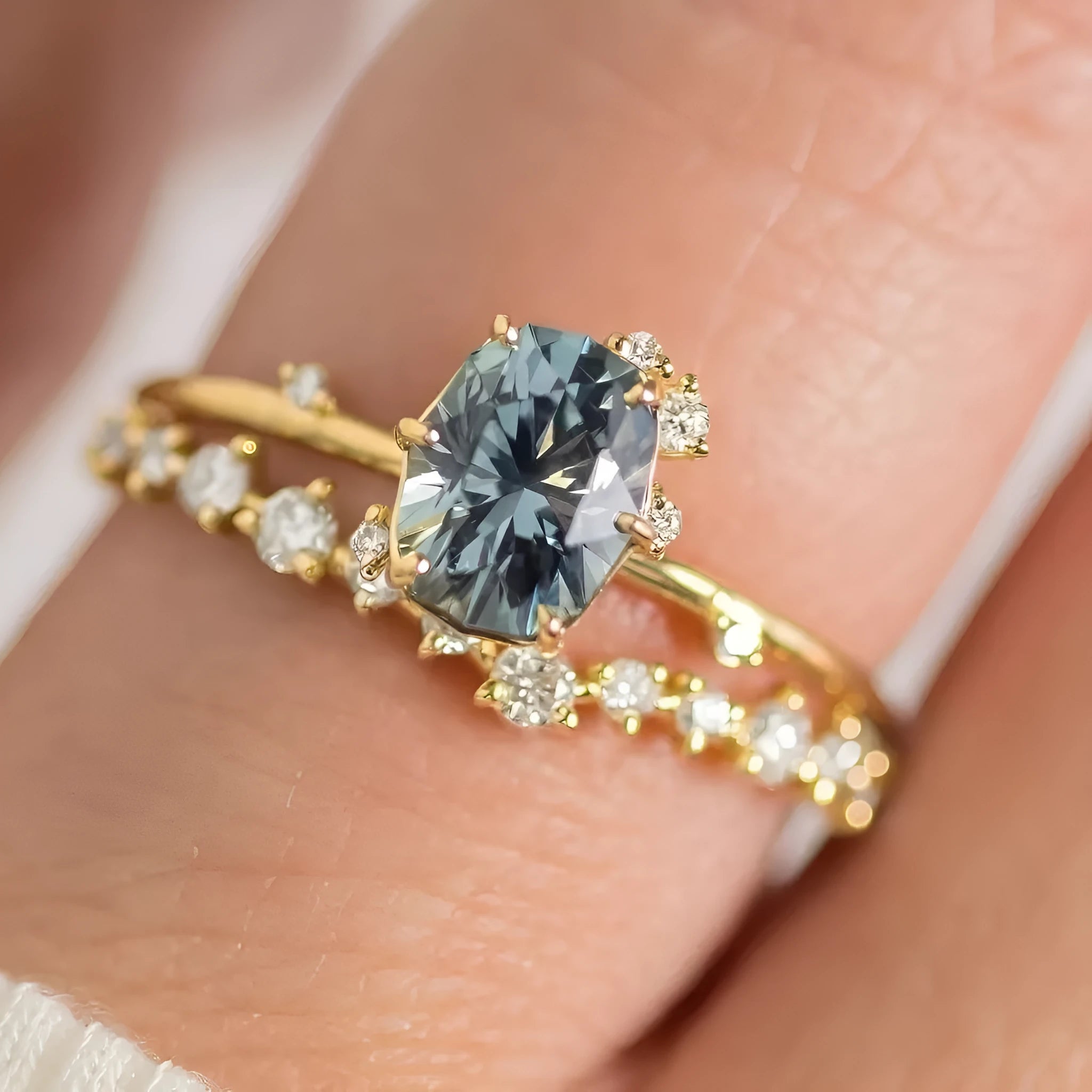 Gold plated alloy ring with floral design and green zircon stone, shown in various sizes