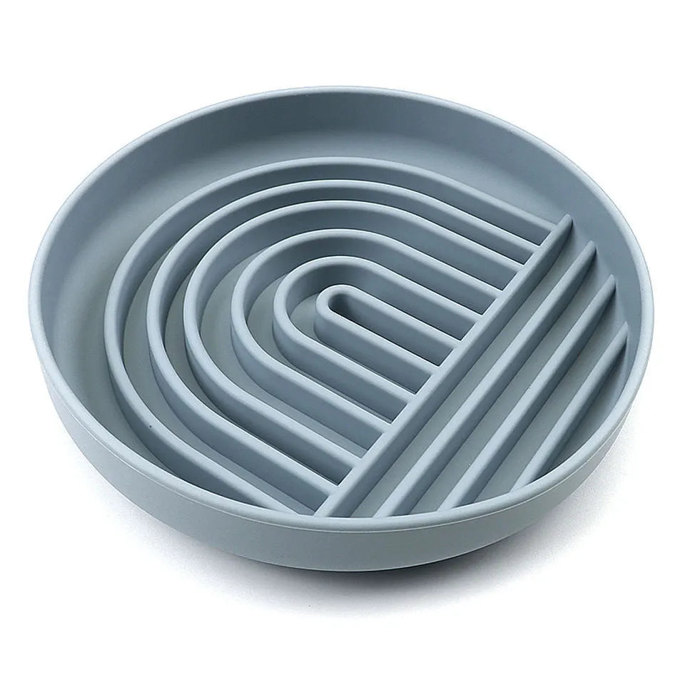 Silicone slow feeder dog bowl with ridges, shown in mustard green colour.