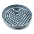 Silicone slow feeder dog bowl with ridges, shown in mustard green colour.