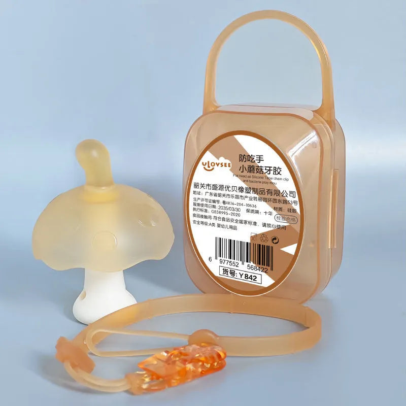 Small mushroom-shaped silicone gel chew toy in transparent storage box with nano chain attachment